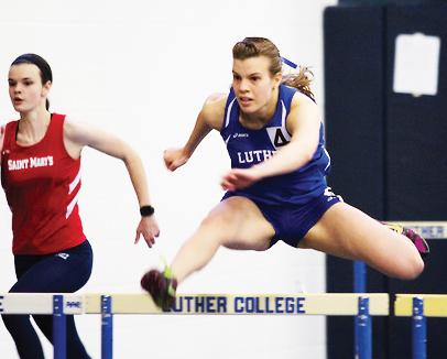 Jackie Krawczyk (‘18) hurdling at Luther College Alumni meet.