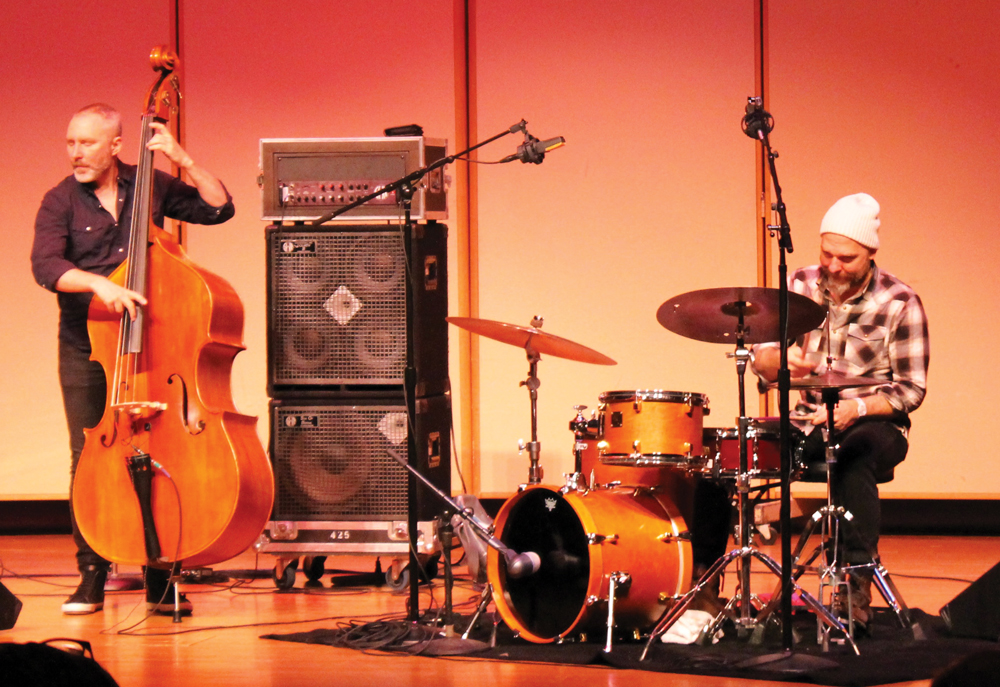 David King and Reid Anderson, members of The Bad Plus, perform in the Center for Faith and Life.