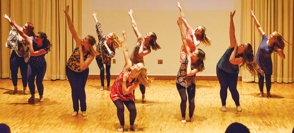 Members+of+Orchesis+left+to+right%3A+Danica+Kafton+%28%E2%80%9818%29%2C+Bethany+Larson+%28%E2%80%9819%29%2C+Jacqueline+Schnier+%28%E2%80%9817%29%2C+Selena+LeGarde+%28%E2%80%9817%29%2C+Haley+Steffen+%28%E2%80%9819%29%2C+Alyssa+Wildenauer+%28%E2%80%9817%29%2C+Lindsey+Ahlers+%28%E2%80%9818%29%2C+Abby+Suhr+%28%E2%80%9818%29%2C+Grace+Larsen+%28%E2%80%9819%29%2C+and+Amanda+Nyquist+%28%E2%80%9819%29+perform+in+a+rehearsal.
