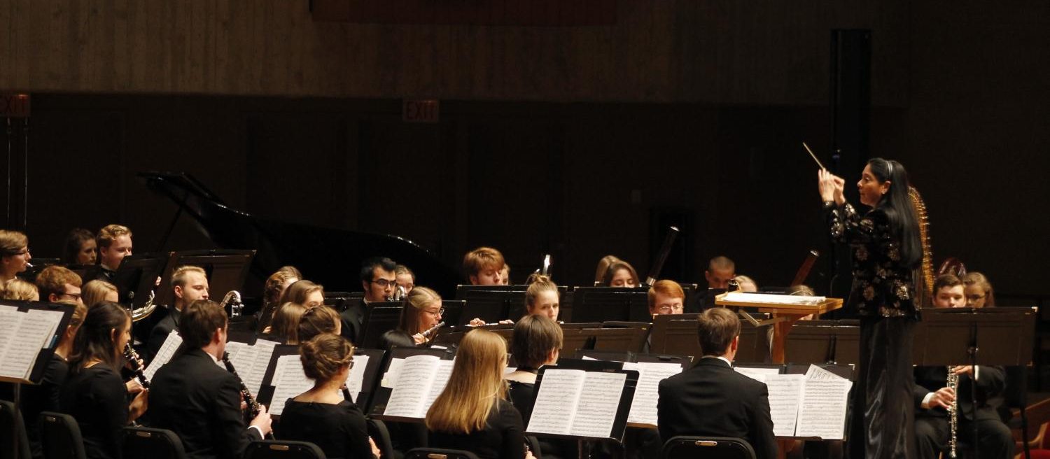 Director of Bands and Associate Professor of Music Joan deAlbuquerque conducts Concert Band during the Homecoming Concert.