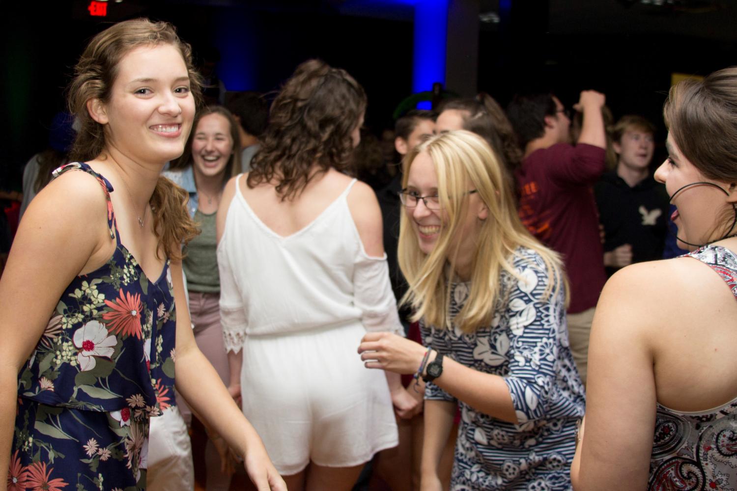 Maya Evans (‘19) and Sari Kroschel (‘19) enjoy good company and fun music at the Flamingo Ball.