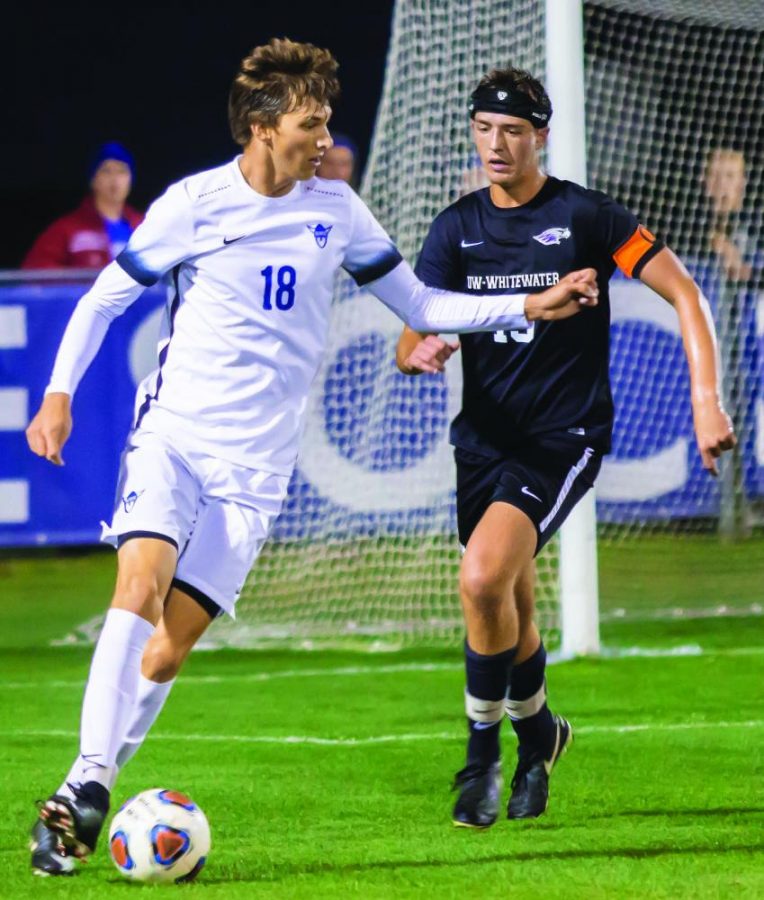 Benjamin+Keller+%28%E2%80%9820%29+positions+the+ball+in+game+against+UW-Whitewater.
