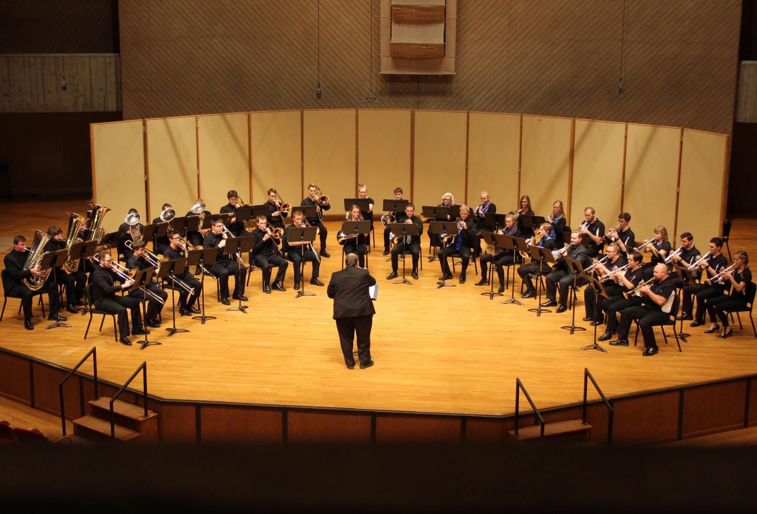 The Brass Choir performs “Out of the Depths I Cry to Thee: Thematic Transformations for Brass Choir,” which was written and conducted by Associate Professor of Music Michael Smith.