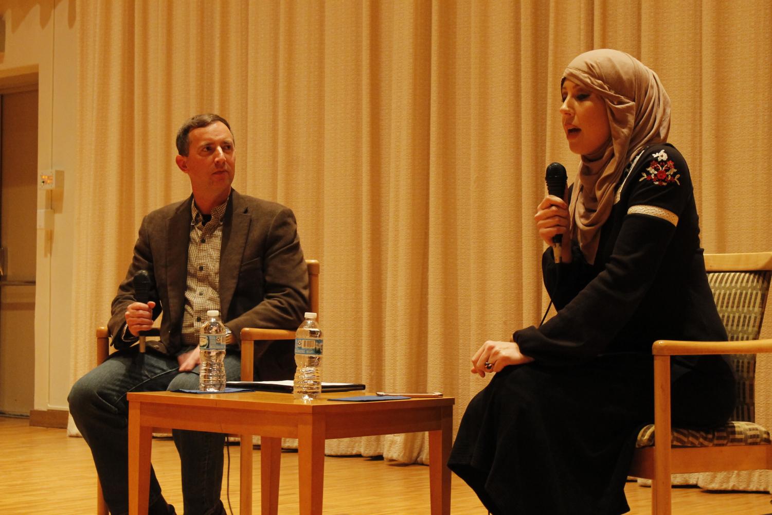 Associate Professor of Religion Todd Green directing a discussion with Regina Mustafa.