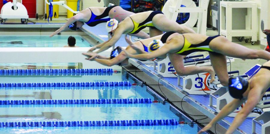 Luther+and+Eau+Claire+swimmers+dive+into+the+water+at+the+gun.