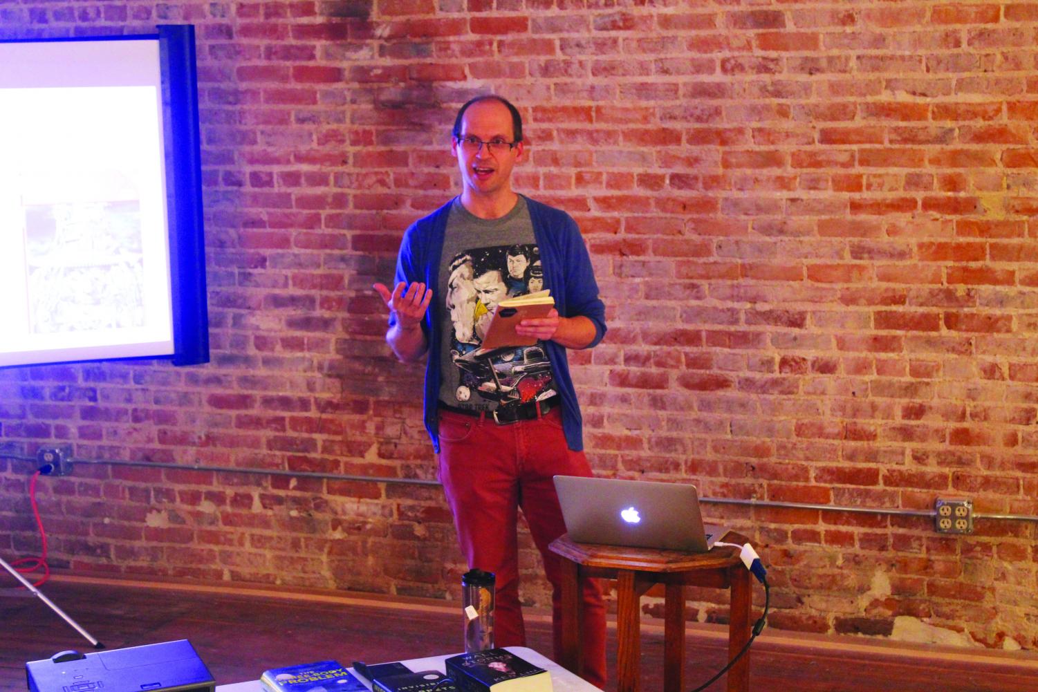 Andy Hageman giving his presentation “Panda Planet: an Intro to Chinese Sci-Fi” at The Lingonberry.