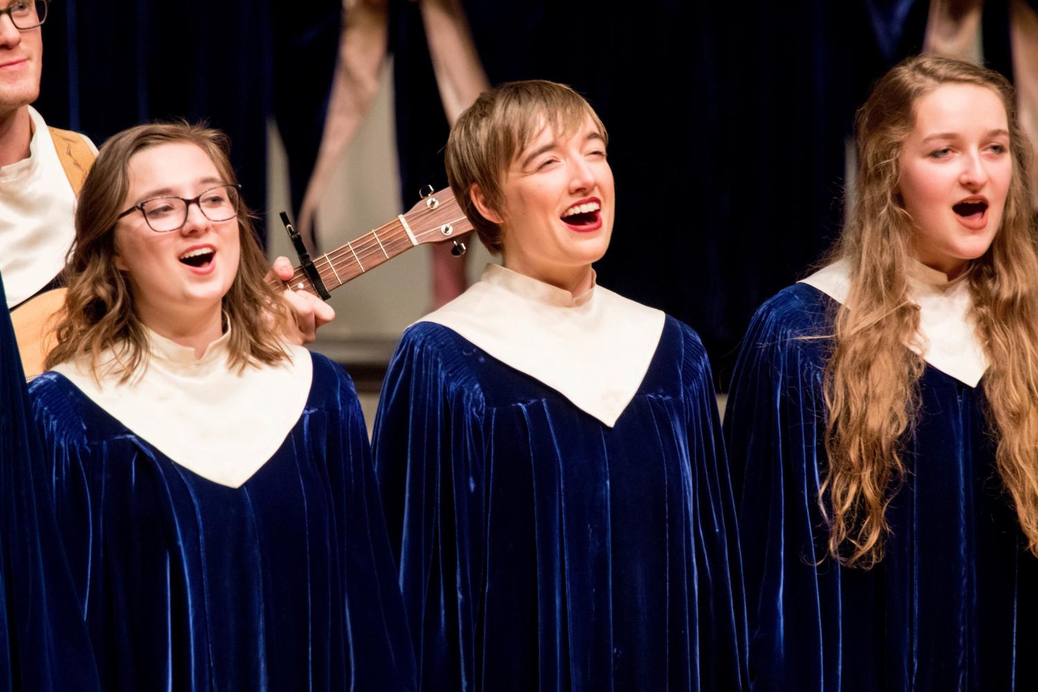 Elizabeth Fischer (‘19), Aidan Spencer (‘18), and Anna Streeper (‘18) sing in the featured ensemble for “Long Time Traveller/Swing Low Sail High.”