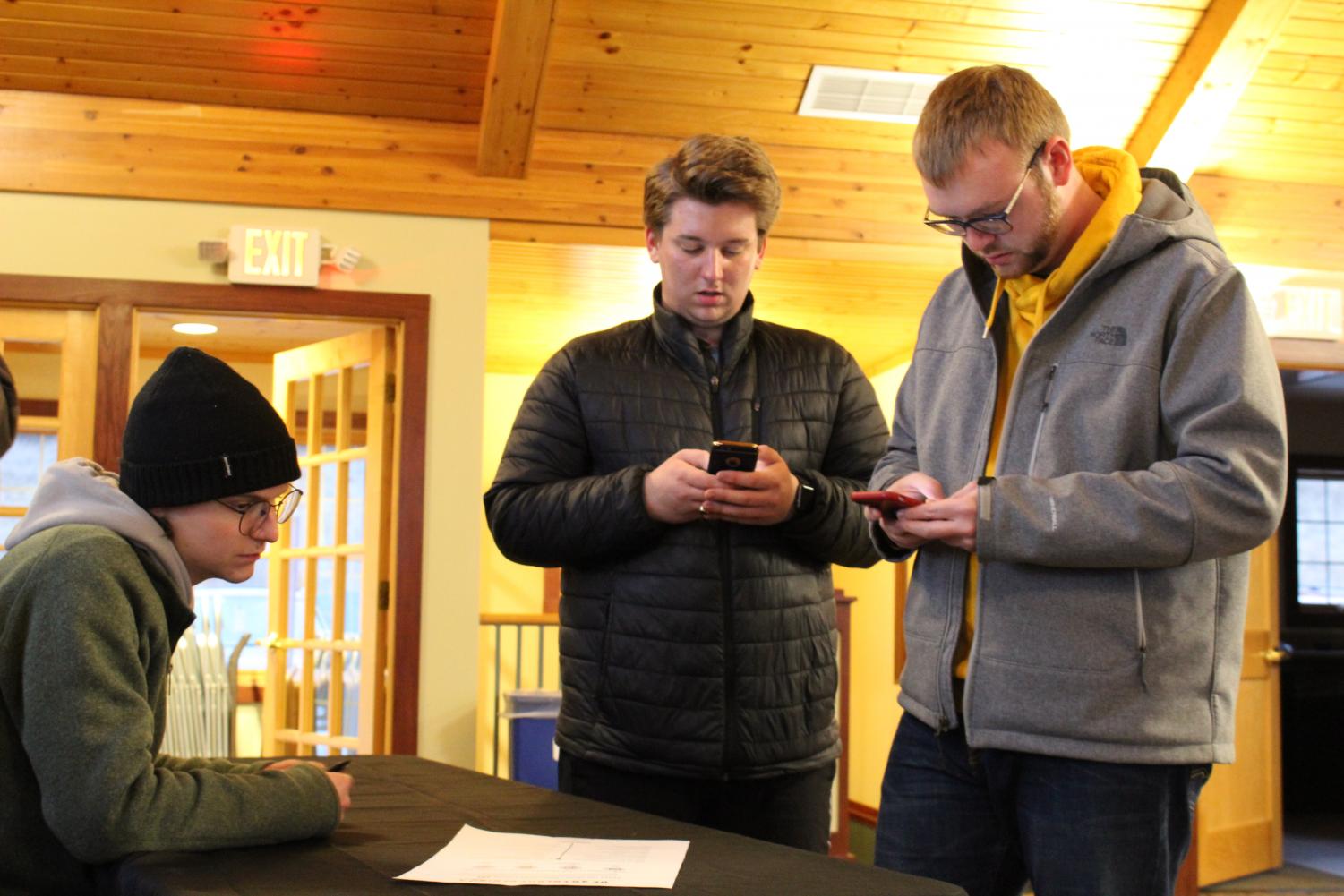 Quinton Griffith ('18) and Erik Nelson ('18) use the new web app at “The Appening.