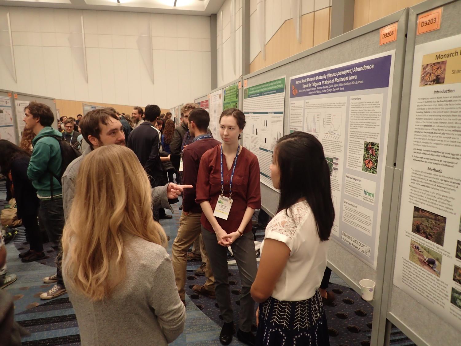 Laurie Adrian ('16), Elizabeth Glennon ('19), and Anna Li Holey ('18) present their poster at the Enomological Society of America's annual meeting.