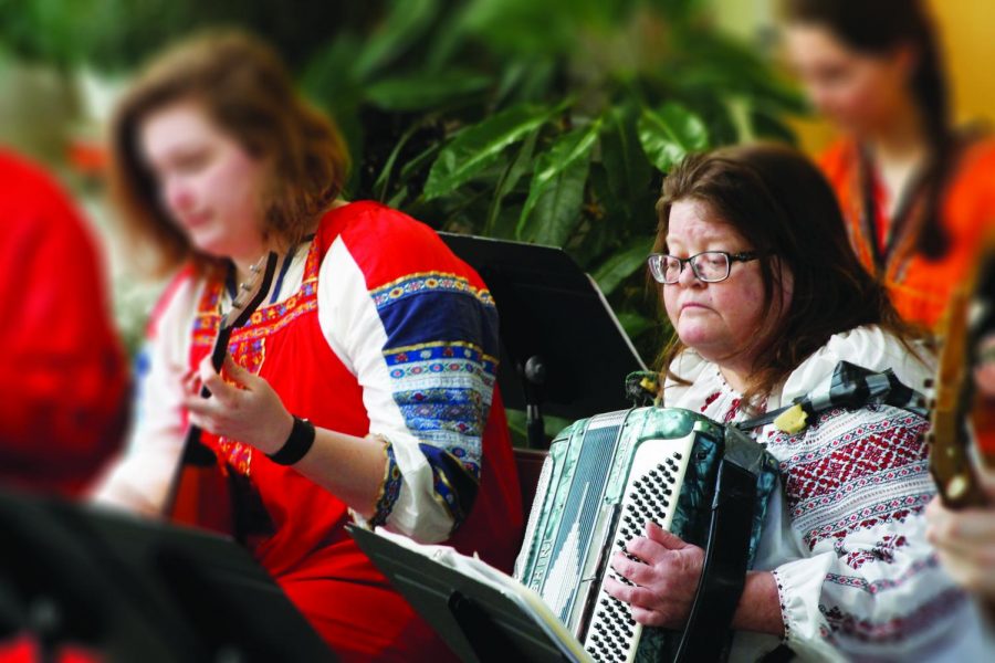 Full+Professor+of+Russian+Studies+and+founder+of+the+Balalaika+Ensemble+Laurie+Iudin-Nelson+plays+the+accordian+during+the+Balalaika+Concert.