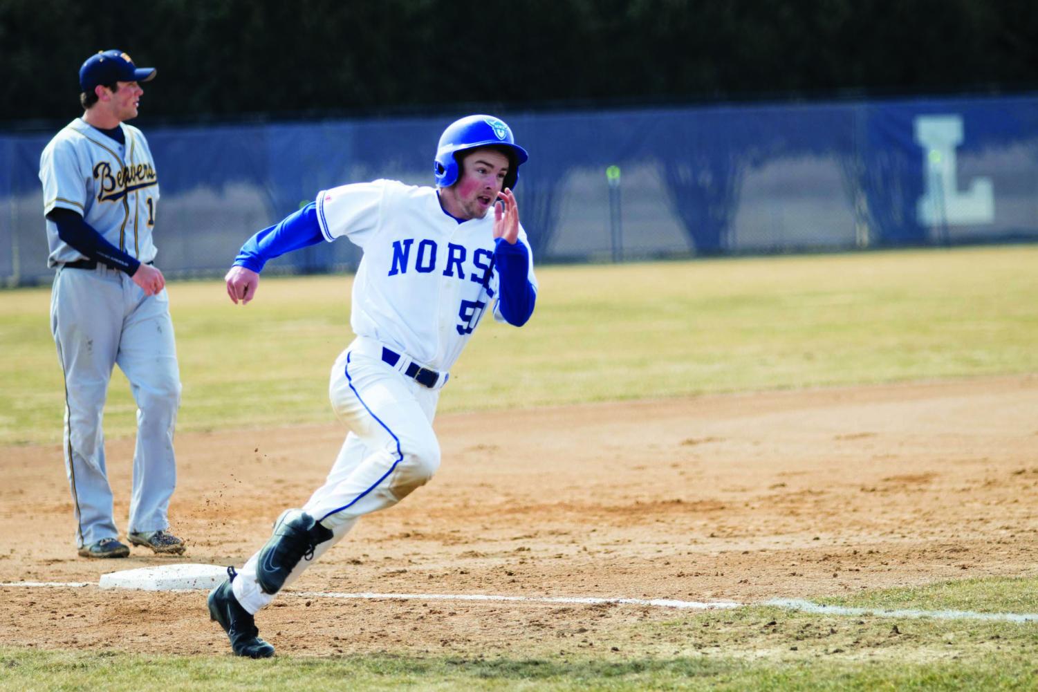 Jared Swanson (‘21) runs around the bases after a hit earlier in the season.