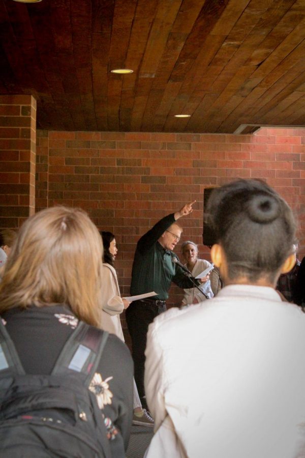 Campus Pastor Mike Blair leads students in an Interfaith prayer vigil.