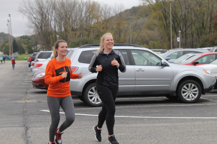 Anni+Hedges+%28%2722%29+and+Meghan+Rice+%28%2722%29+participate+in+the+Donut+Dash.