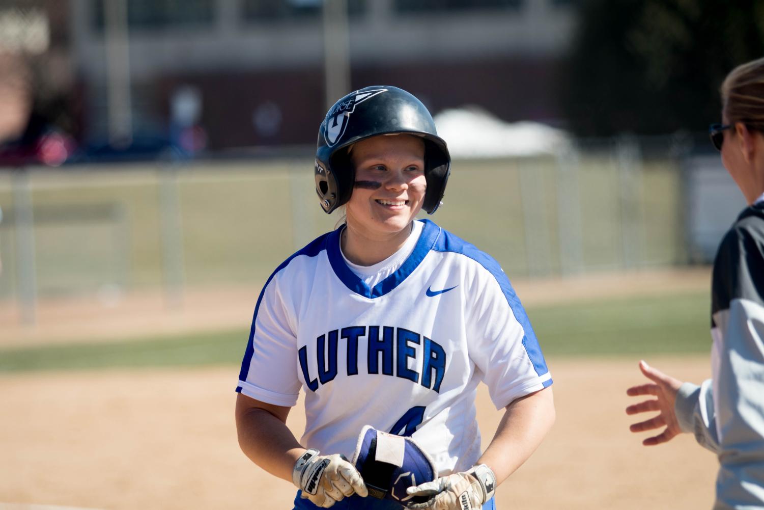 Anna Strien (‘18) rejoices after an RBI she hit during a game against Nebraska Wesleyan in the 2018 season.