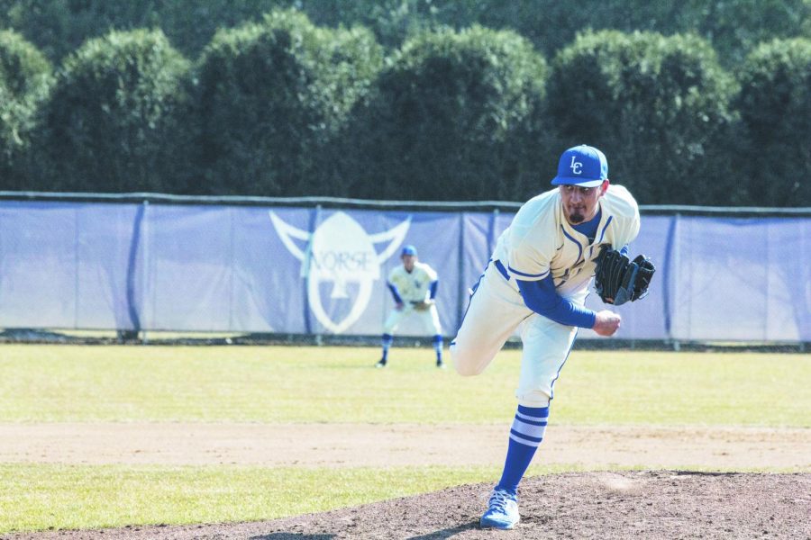 John Colucci III (‘22) pitches during a game against Wartburg College on April 2.