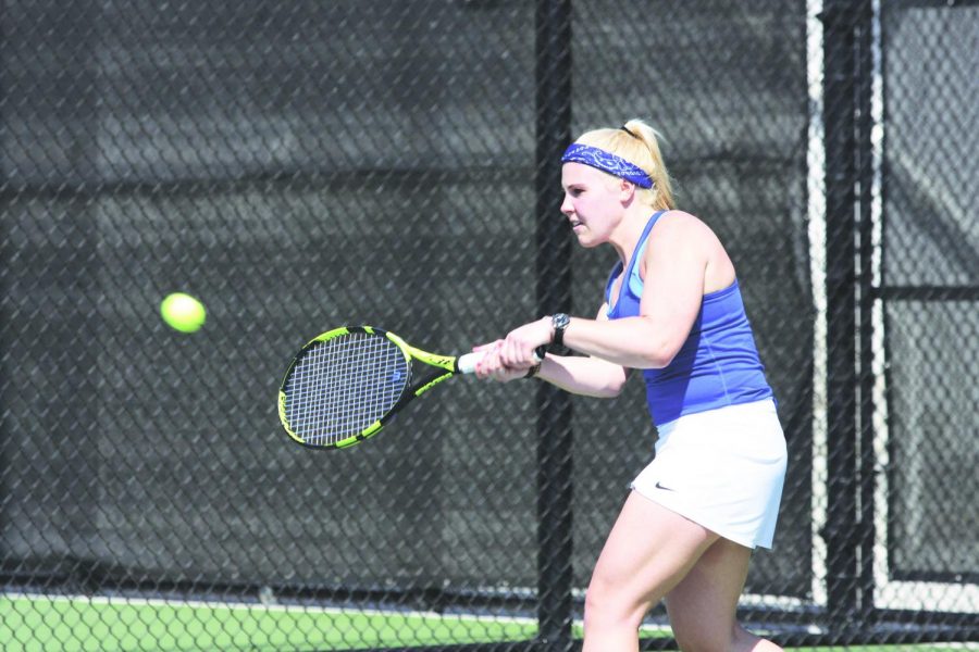 Britta Pressler (‘19) hits a backhand during a game over spring break. 	