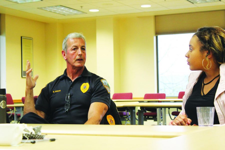 Chief+of+Police+for+the+City+of+Decorah+Bill+Nixon+and+student+Maya+Mukamuri+%28%E2%80%9822%29+attended+the+tea+and+talk+event.
