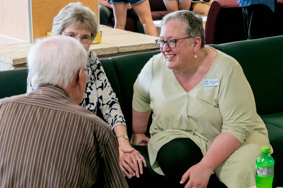 President Jenifer K. Ward speaks with members of the community at a Campus Coffee Break meet and greet this summer.