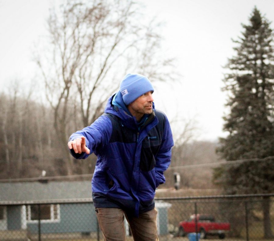 Steve Pasche directs students at a meet at St. Marys University in 2018. 