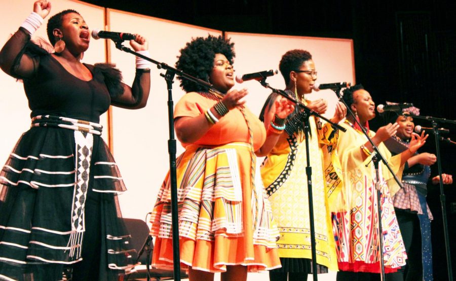 Nobuntu teaches the audience how to click while they perform a song.