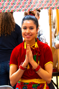 Aakriti Baral (23) represents her culture at the Nepal booth.