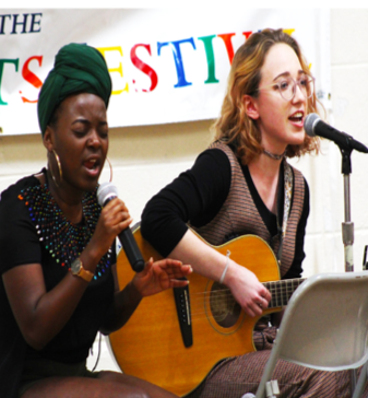 Fezile Mnisi (20) and Brooke Prohaska (21) perform a duet.