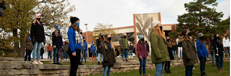 Luther College Aurora Choir gathers in Bentdahl Commons to record while wearing masks and socially distancing per Luther Colleges COVID-19 guidelines. 