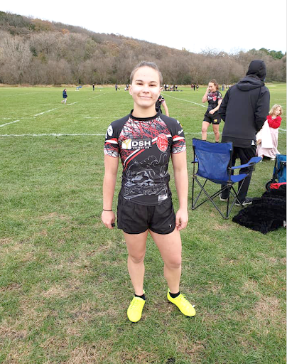 Kemp prior to a game against the Winona St. Womens Rugby team.