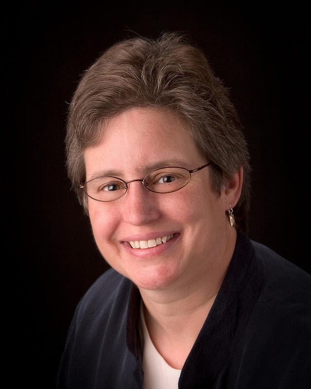 Professor of English Nancy Barry smiling for a headshot picture. Photo courtesy of luther.edu