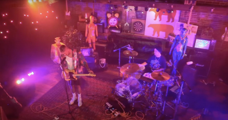 Neon Dreams performs their set for KWLC’s first virtual concert series. Frank Kadillac is on vocals and guitar, and Adrian Morris on drums. Photo courtesy of Ian Wreisner ('22) | CHIPS