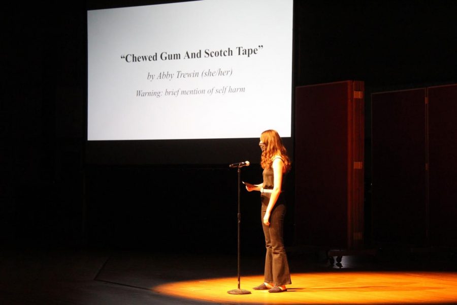 Emma Everitt (21) reads Chewed gum And Scotch Tape by Abby Trewin (22). Photo courtesy of Sarah Damhof (22) | Chips