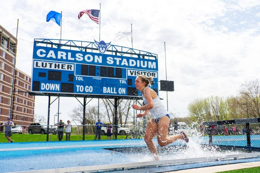  Lauren Berg won the Women’s 3000 meter steeplechase with a time of 12.22.14. It was her first time ever competing in the event. (Photo courtesy of Nick Greseth and Luther College Photo Bureau)