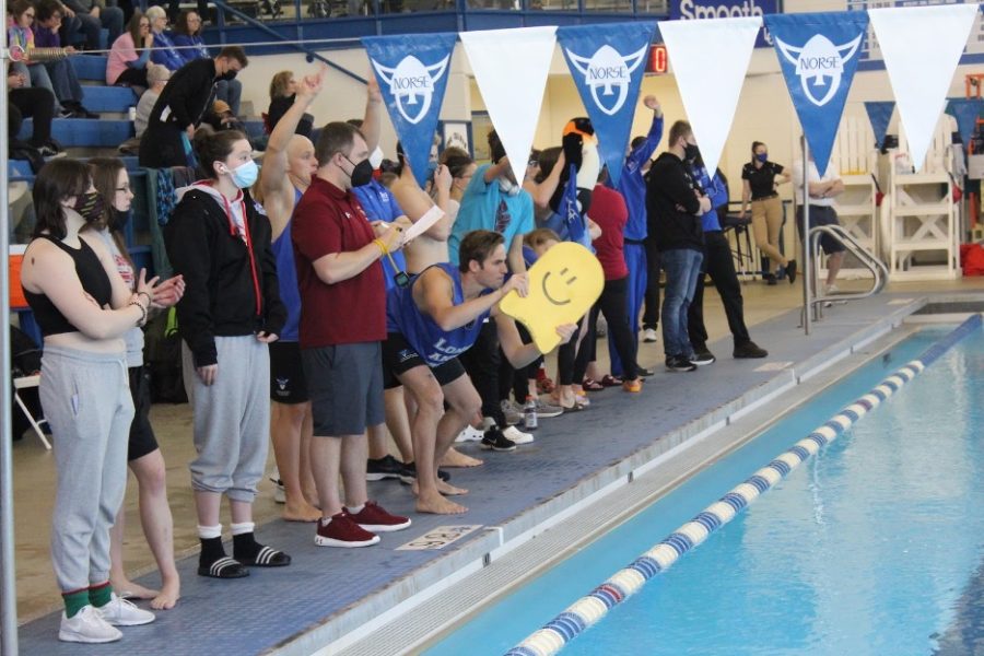 Luther’s Swim and Dive teams cheer on competitors at the ARC Swim and Dive Invitational. 								Sarah Damhof I CHIPS
