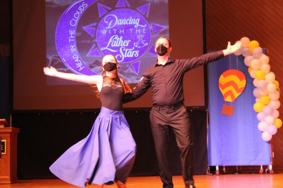 Alison Merrill ‘22 dances the waltz with Associate Professor of Religion Todd Green.
