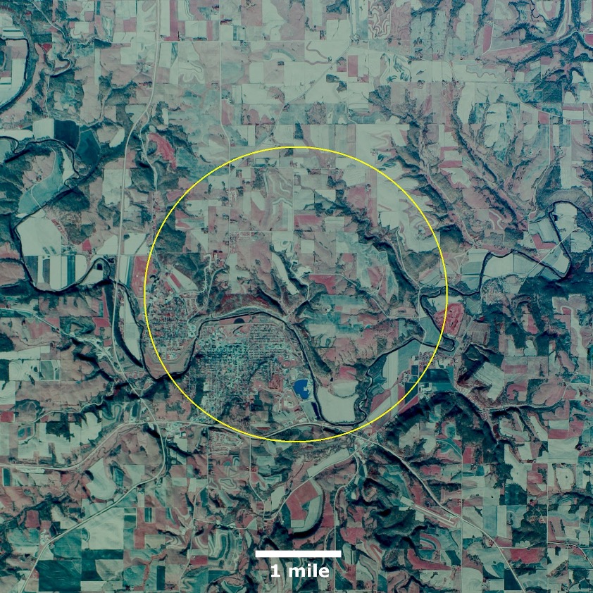 This graphic indicates the approximate size of the Decorah Crater in relation to a 1980 United States Geological Survey air photo of the city of Decorah. (Photo courtesy of Public Domain)