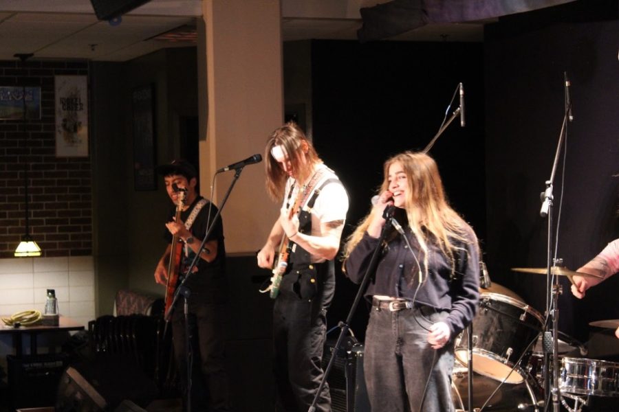 Killed by Kiwis guitarists Simon Midtbo, Frankie Carlson, and siner Annie Thoma ('22) perform in Marty's