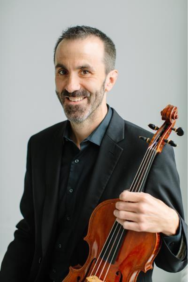 Professor of Music Spencer Martin accompanied the Fairmount String Quartet in a recent performance on September 17. Photo courtesy of Decorah News. 