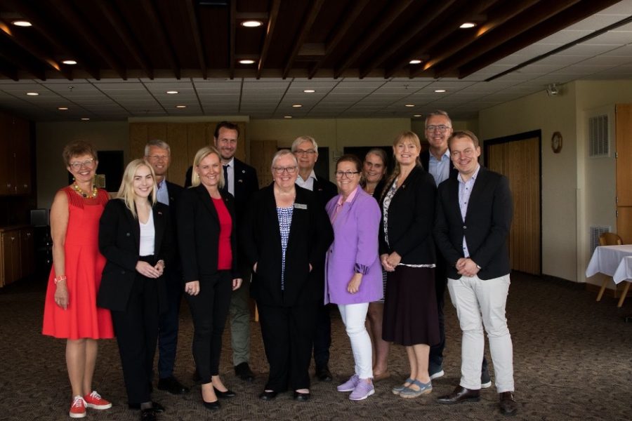 The Norwegian Delegates pose for a photo with President Ward. Photo courtesy of Danica Nolton, Luther College Photo Bureau. 