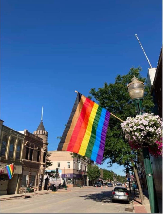 Photo of Pride Flags on Water Street in Decorah. Credit to Decorah Pride Facebook 