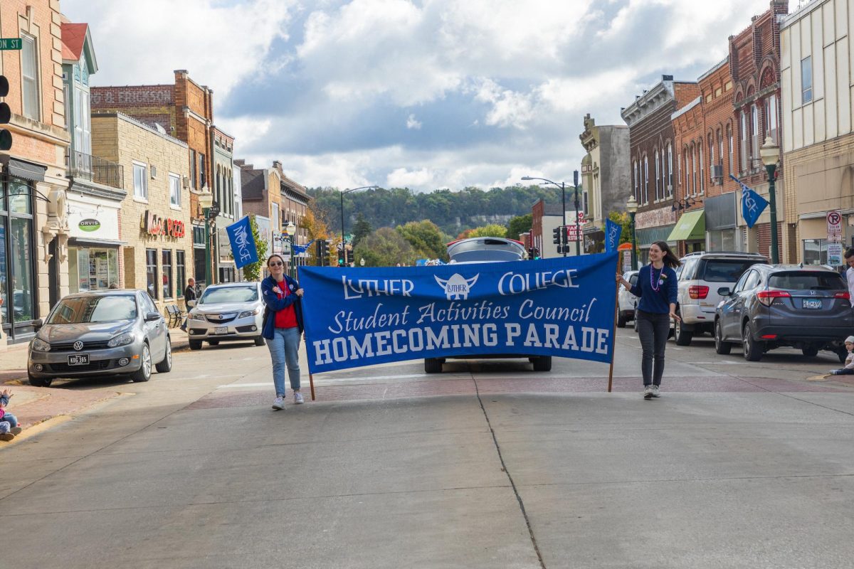 The 2023 Luther Homecoming Parade moves through downtown Decorah. Photo courtesy of Armando Jenkins-Vazquez (21)/Luther College Photo Bureau.