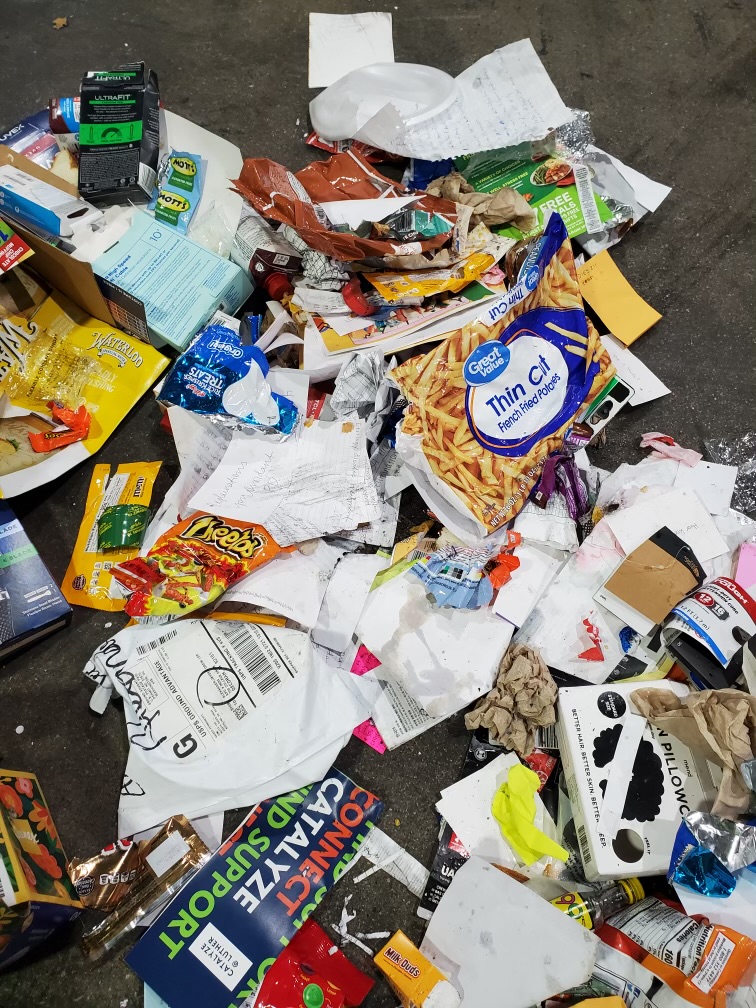 A picture of the contaminated paper section of a Luther recycling bin was sent to the Luther student body on November 8. Photo courtesy of Winneshiek County Recycling Plant.