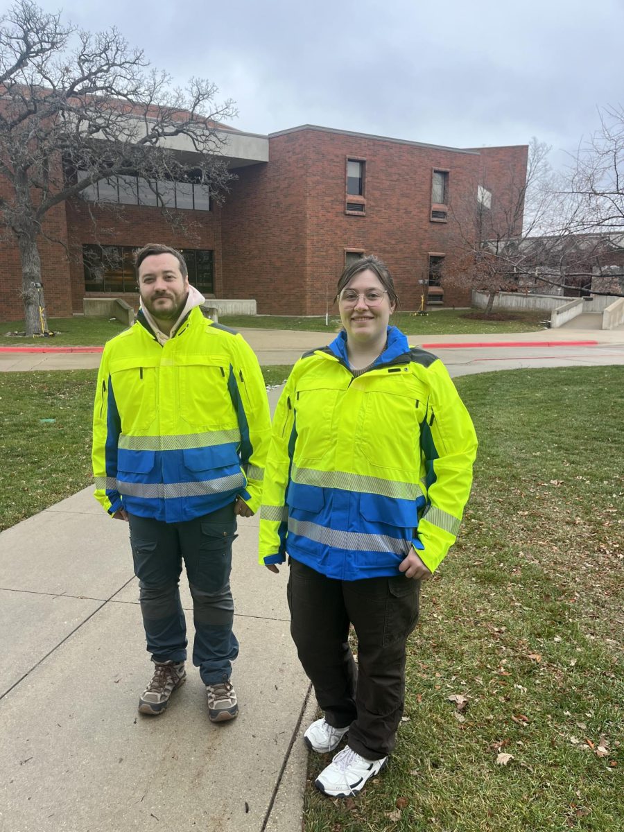 Campus responders Nahaylem Ellis (left) and Bree Murphy (right) in the new Campus Safety jackets, which all members of the department will be required to wear starting in J-Term. Photo courtesy of Bob Palmer.