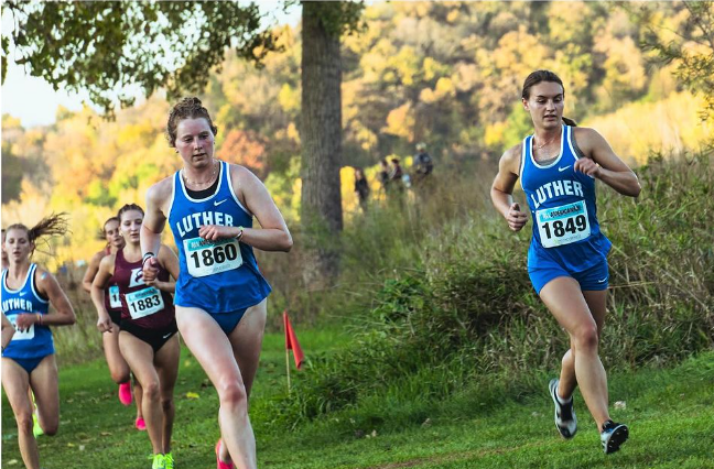 Julia Veit (24, left) and Morgan Hansen (24, right) run during Luthers dual race against UW La-Crosse on October 20.