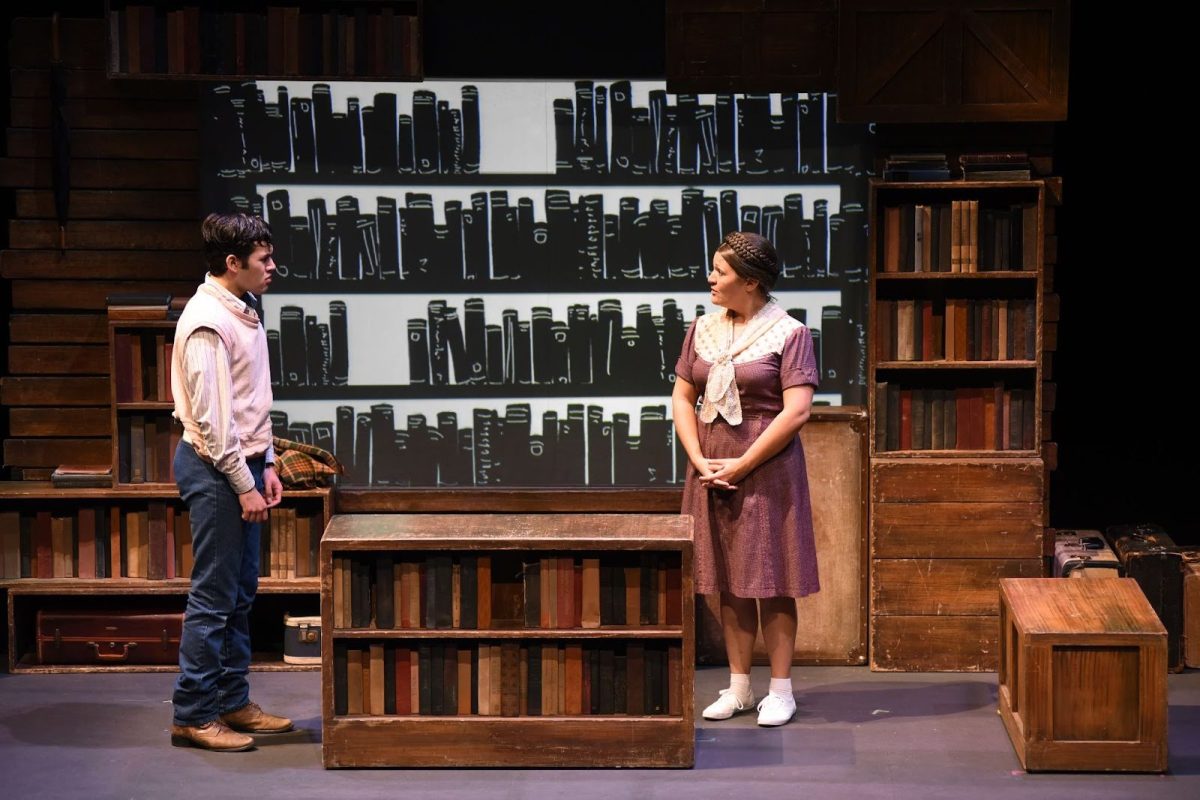 Gustavo A. Flores and Amanda Lopez Castillo in Tomás and the Library Lady. Photo courtesy of Childsplay Theatre Inc./Tim Trumble Photo.