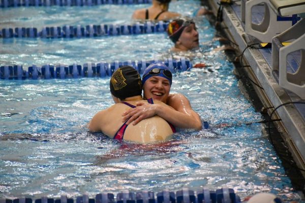 Mia Prater (27) swam a record-breaking time in the womens 50 freestyle at the A-R-C Championships, which qualified her for the NCAA DIII Swimming and Diving Championships on March 20-23. Photo courtesy of Luther College Photo Bureau.