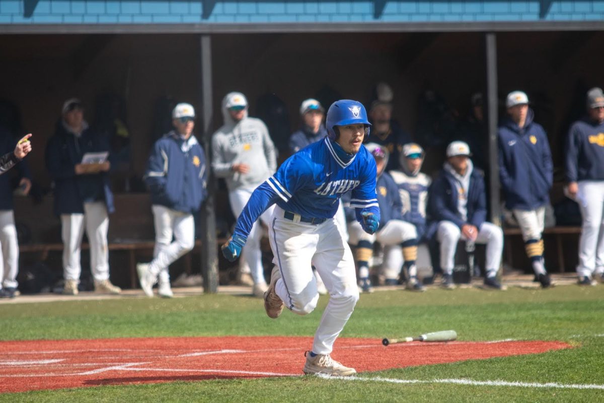 Stamp runs to first base after getting a hit during Luther’s 8-2 win over Buena Vista University on April 19. Photo courtesy of Luther College Photo Bureau. 