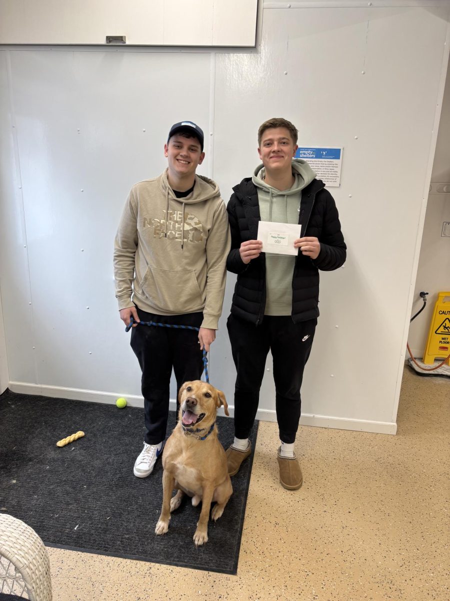 Tri-O members delivering a donation to the Love & Friendship Adoption Center - Humane Society of Northeast Iowa in Decorah. Photo Courtesy of HSNEI