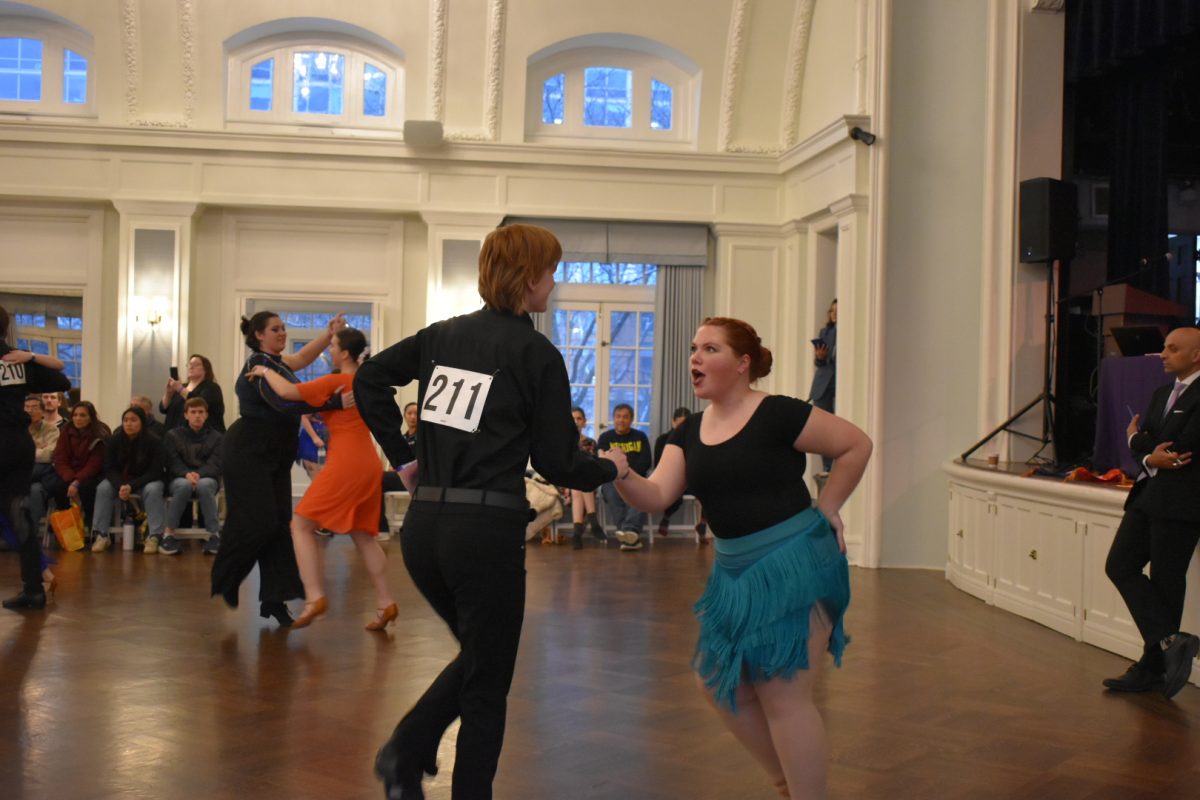 President Ingrid Roeske ('27) competing in bronze rhythm with her dance partner at Northwestern Dancesport Classic in 2025. Photo courtesy of the Ballroom & Swing Team