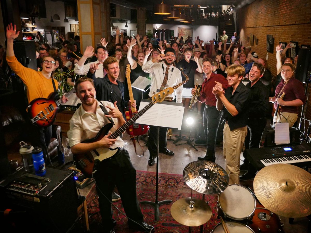 Members of The Driftless Jazz Collective pose with the audence at Impact Coffee. From left to right: Noah Bowers (‘26), Micheal Van Meter (‘26), Christain Montover (‘26), Jamie Deets (‘28), Linaea Walsh (‘27), David Helbling (‘26),  Kristian Stordalen (‘26), Simon McDonald (’26), Carter Sommerness (‘26) and Ben Hilgers (‘26). Photo courtesy of Bill Rosholt ('90).