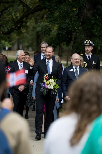 His Royal Highness Crown Prince Harken of Norway walking through the Luther College campus with president Brad Chamberlain.
